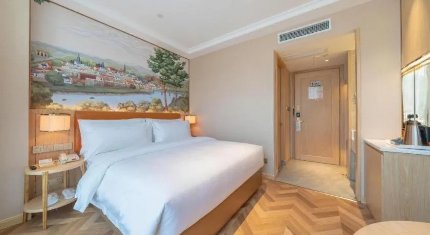 Bed in Vienna Hotel Chongqing West Station Square