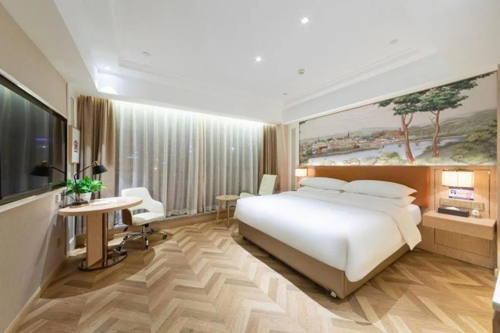 Bed in Vienna Hotel Chongqing West Station Square