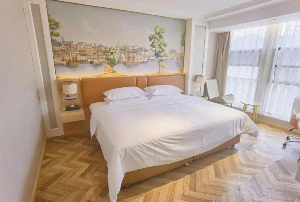 Bed in Vienna Hotel Chongqing West Station Square