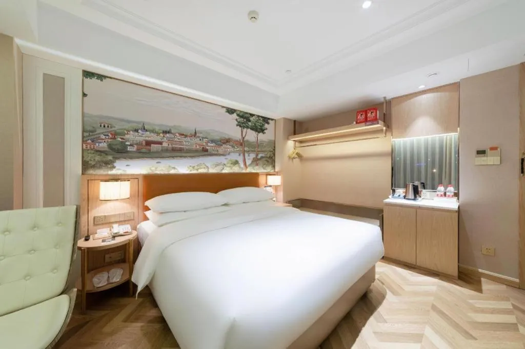 Bed in Vienna Hotel Chongqing West Station Square