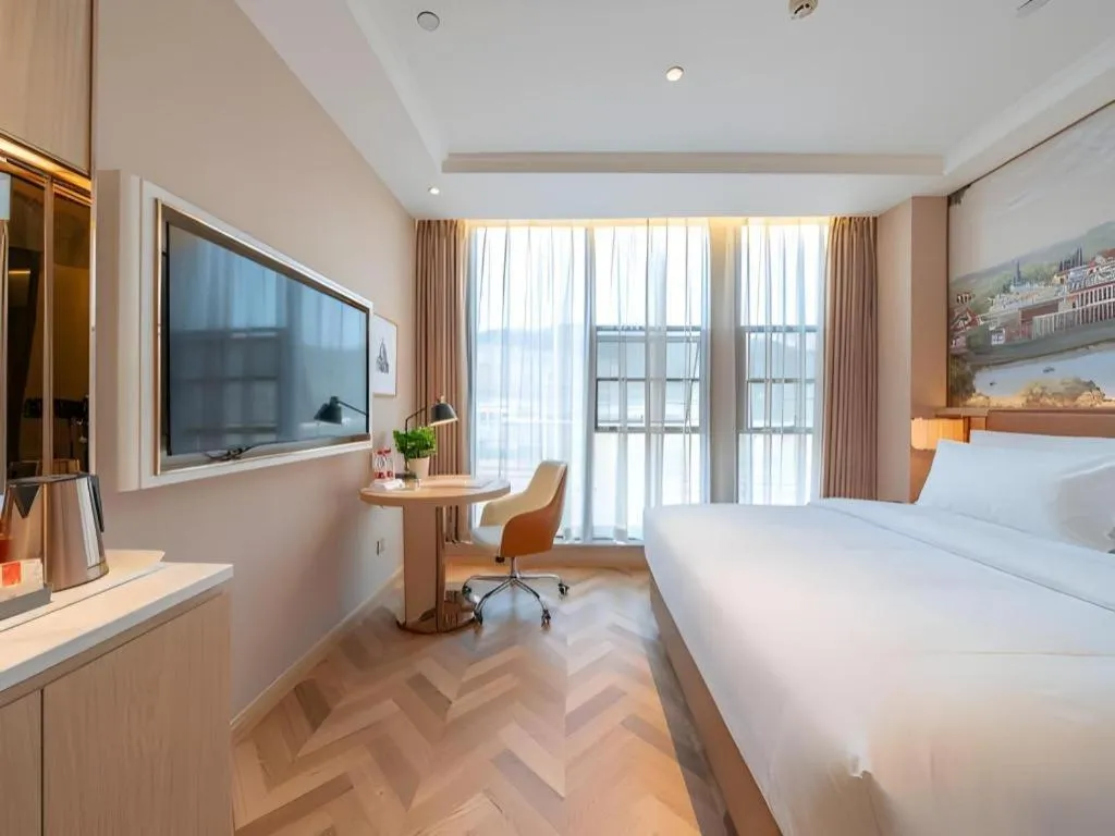 Bed in Vienna Hotel Chongqing West Station Square