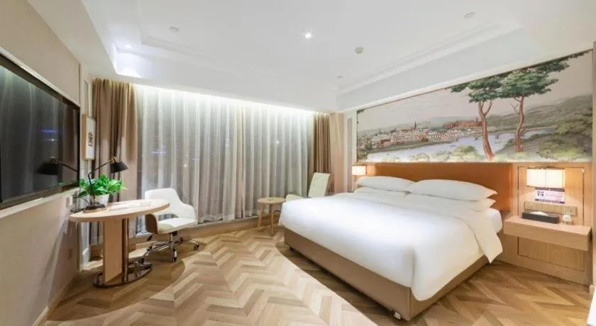 Bed in Vienna Hotel Chongqing West Station Square