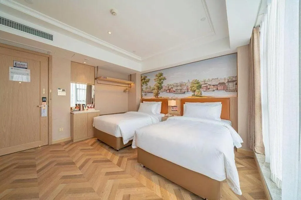 Bed in Vienna Hotel Chongqing West Station Square