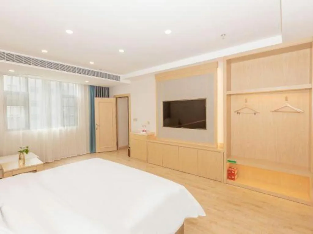 Bed in Vienna Hotel Yuxi Hongta Avenue High-Speed Railway Station