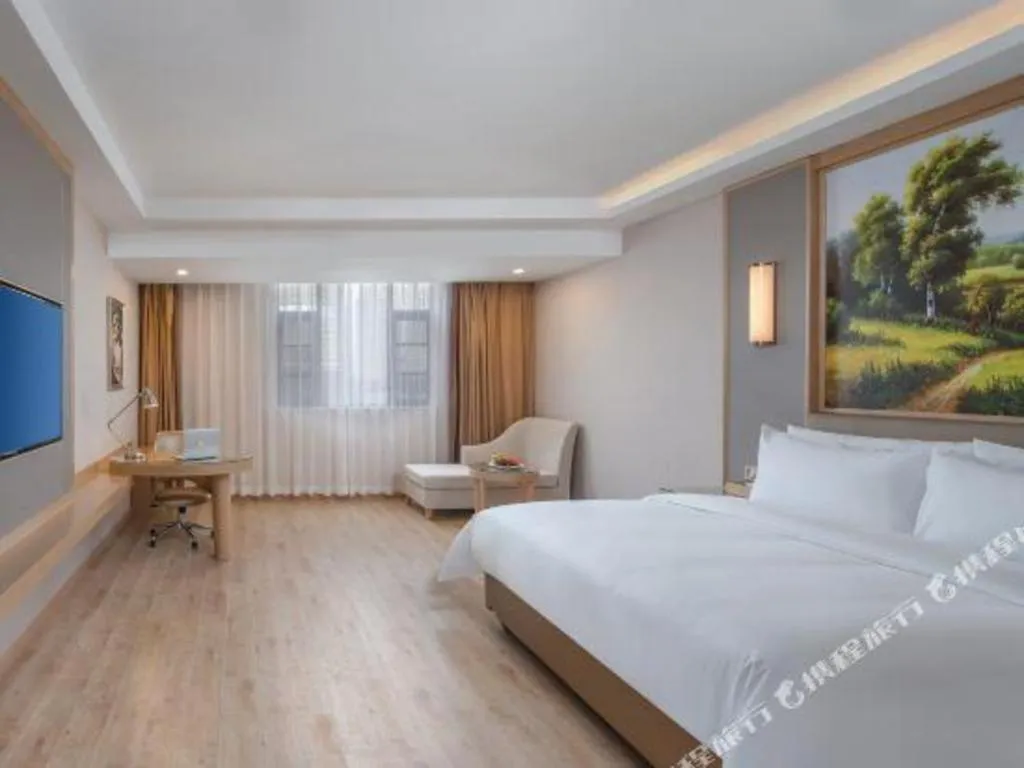 Bed in Vienna Hotel Yuxi Hongta Avenue High-Speed Railway Station