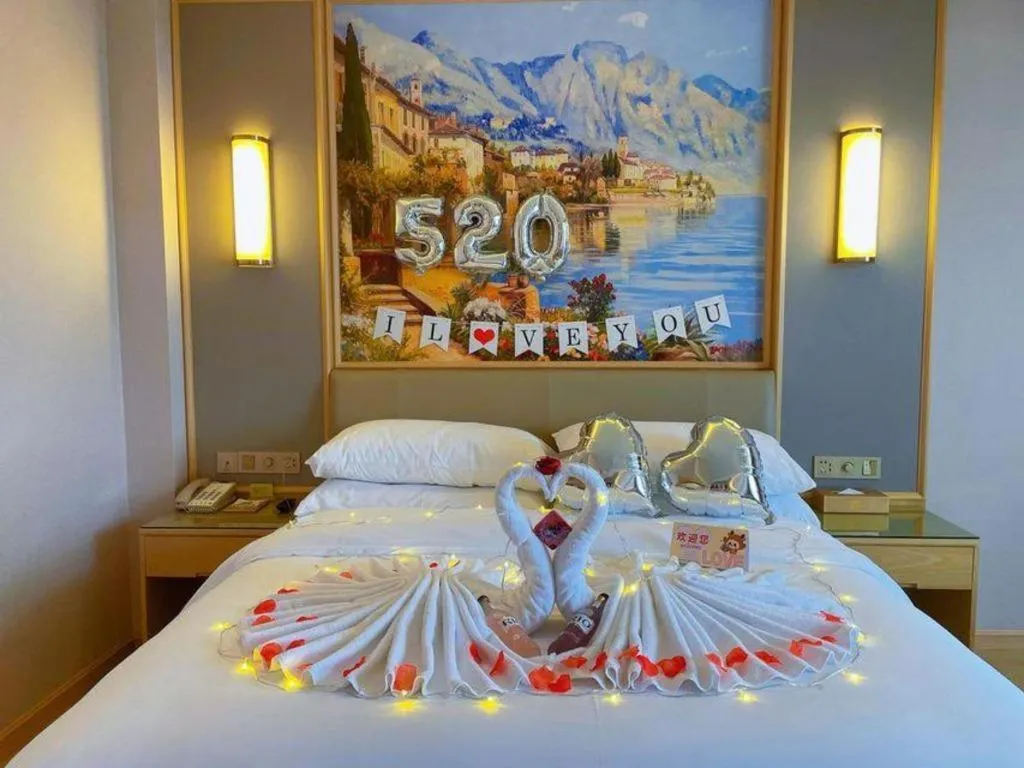 Bed in Vienna Hotel Yuxi Hongta Avenue High-Speed Railway Station