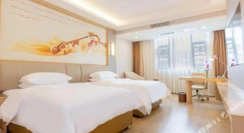 Bed in Vienna Hotel Yuxi Hongta Avenue High-Speed Railway Station