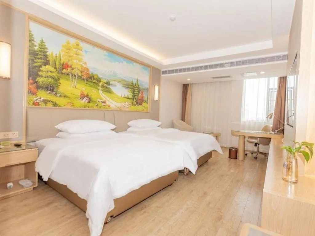 Bed in Vienna Hotel Yuxi Hongta Avenue High-Speed Railway Station