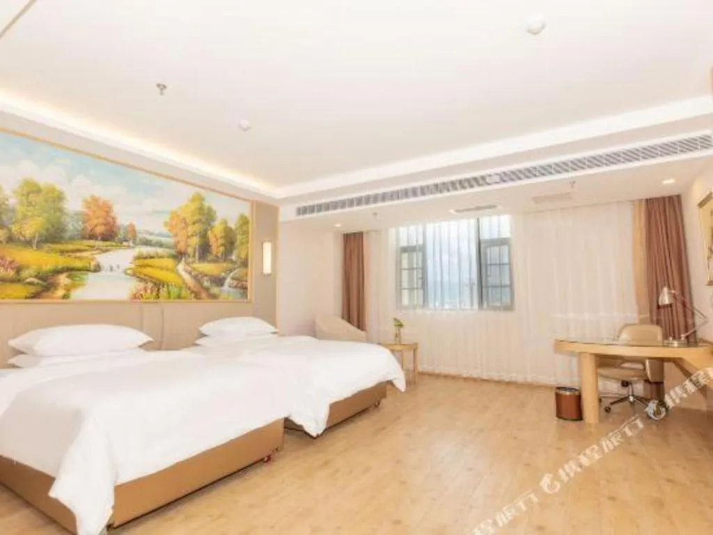 Bed in Vienna Hotel Yuxi Hongta Avenue High-Speed Railway Station