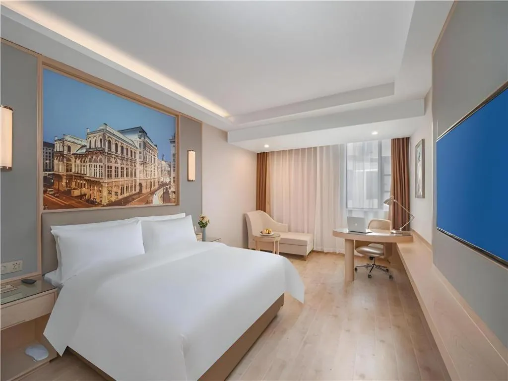 Bed in Vienna Hotel Yuxi Hongta Avenue High-Speed Railway Station