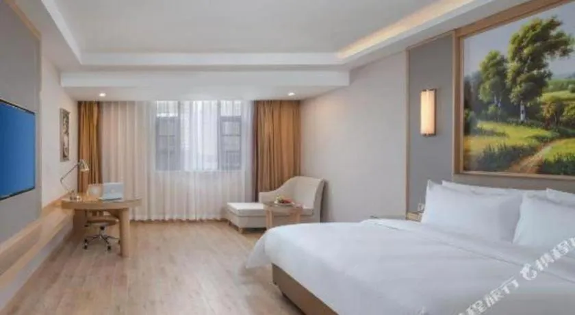 Bed in Vienna Hotel Yuxi Hongta Avenue High-Speed Railway Station