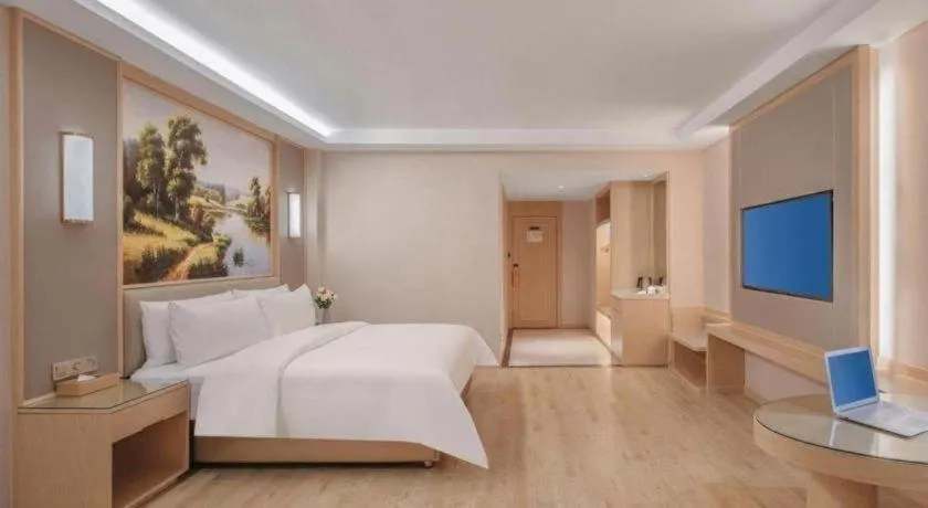 Bed in Vienna Hotel Yuxi Hongta Avenue High-Speed Railway Station