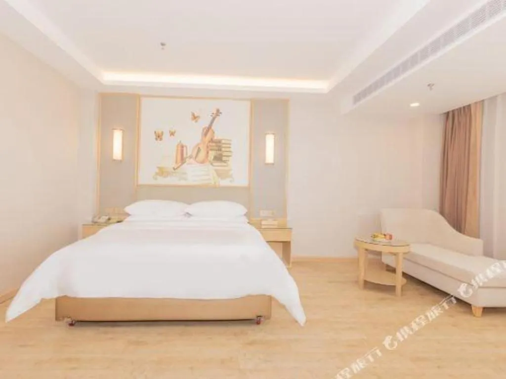 Bed in Vienna Hotel Yuxi Hongta Avenue High-Speed Railway Station