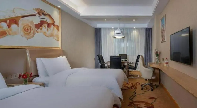 Bed in Vienna Hotel Jiangxi Ji'an Jinggangshan