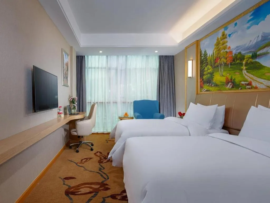 Bed in Vienna Hotel Jiangxi Ji'an Jinggangshan