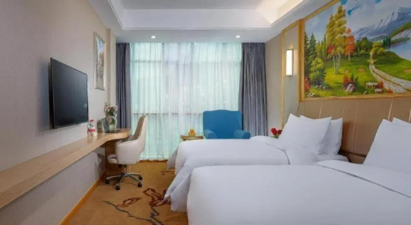 Bed in Vienna Hotel Jiangxi Ji'an Jinggangshan