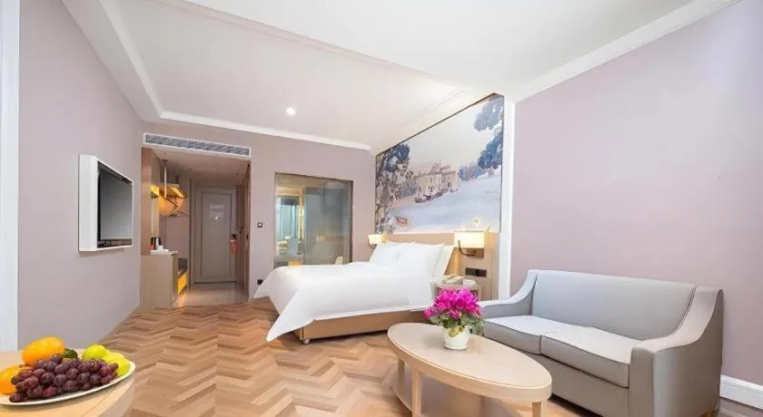 Bed in Vienna Hotel Lincang New Asia Pacific Times Square