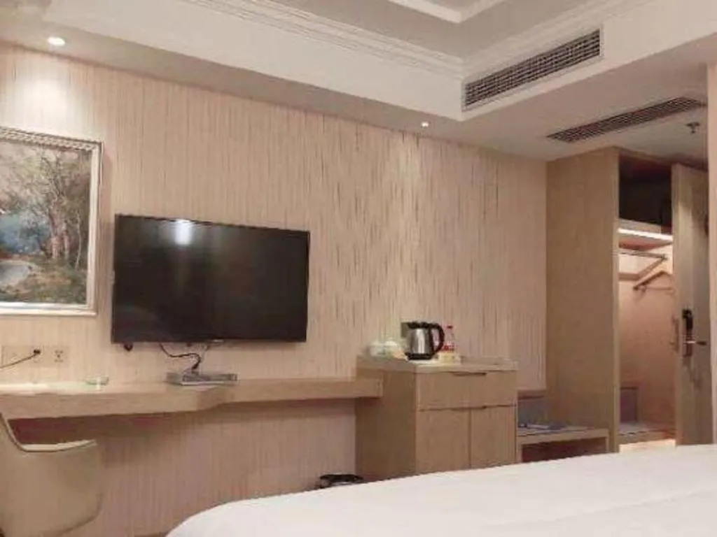 Bed in Vienna Hotel Guangxi Zhongshan Central Plaza West High-Speed Railway Station