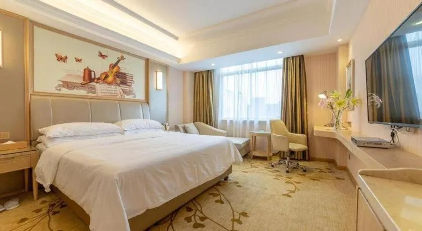 Bed in Vienna Hotel Guangxi Zhongshan Central Plaza West High-Speed Railway Station