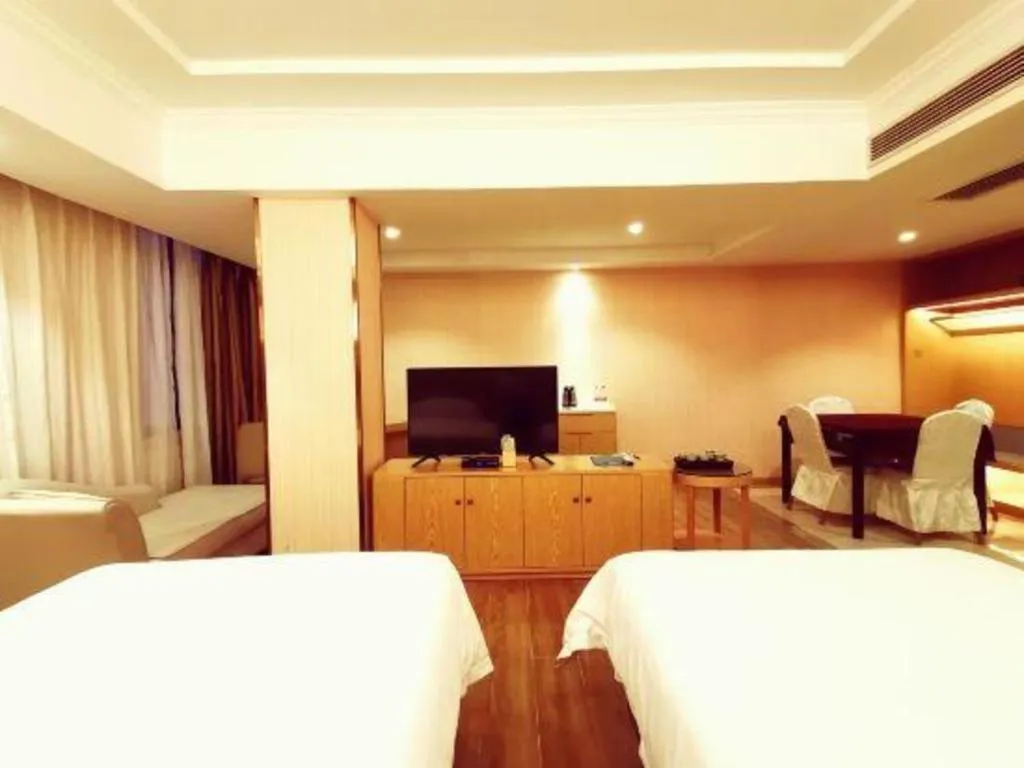 Bed in Vienna Hotel Guangxi Zhongshan Central Plaza West High-Speed Railway Station