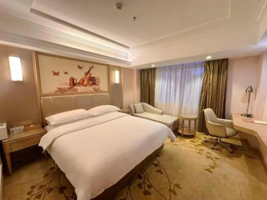 Bed in Vienna Hotel Guangxi Zhongshan Central Plaza West High-Speed Railway Station
