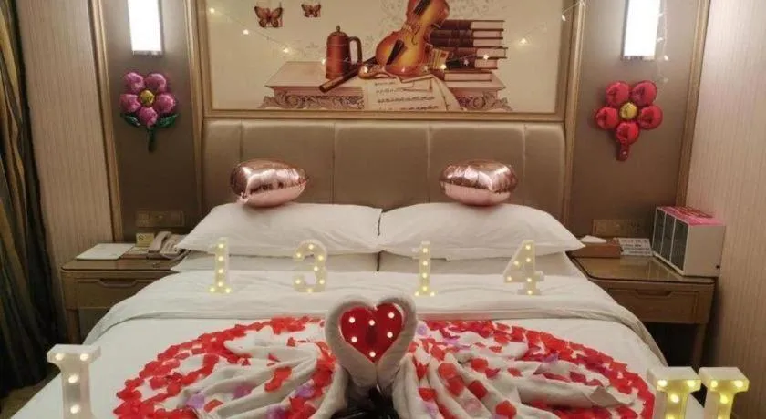 Bed in Vienna Hotel Guangxi Zhongshan Central Plaza West High-Speed Railway Station