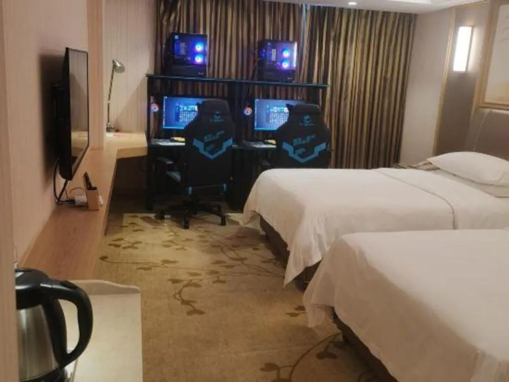 Bed in Vienna Hotel Guangxi Zhongshan Central Plaza West High-Speed Railway Station