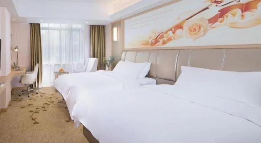 Bed in Vienna Hotel Guangxi Zhongshan Central Plaza West High-Speed Railway Station