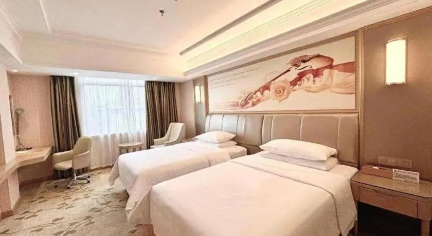 Bed in Vienna Hotel Guangxi Zhongshan Central Plaza West High-Speed Railway Station