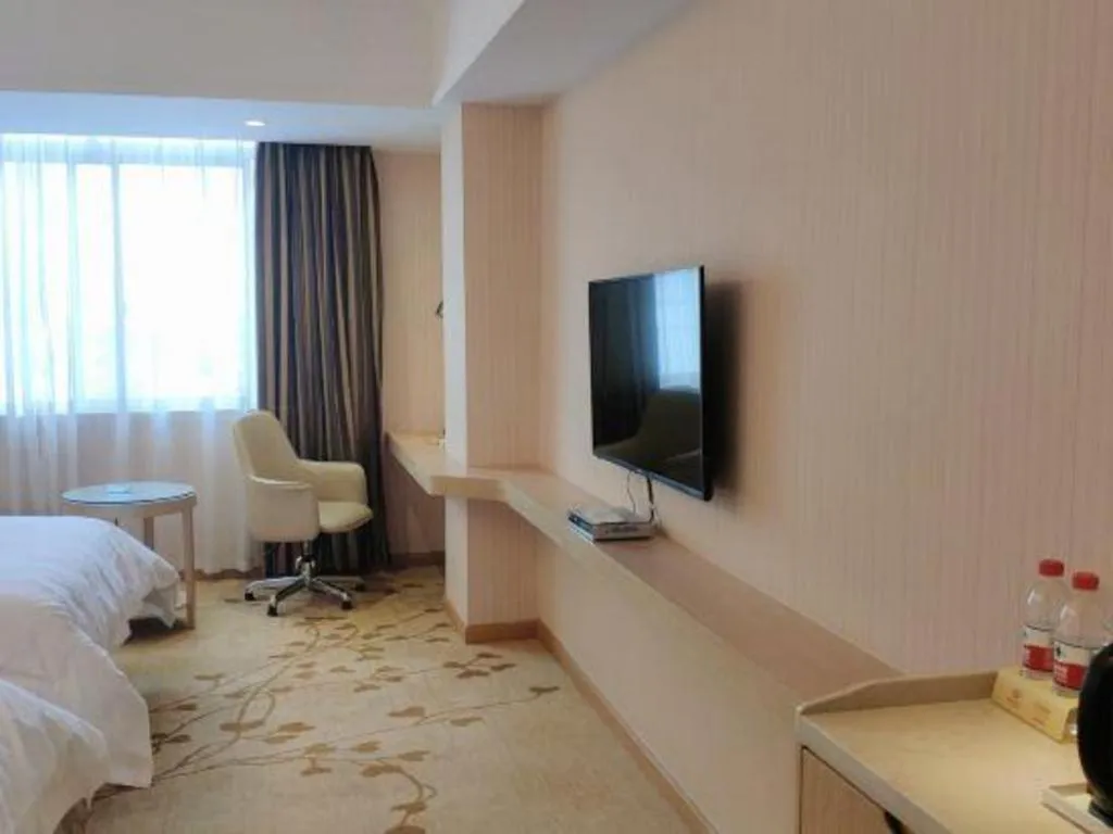 Bed in Vienna Hotel Guangxi Zhongshan Central Plaza West High-Speed Railway Station