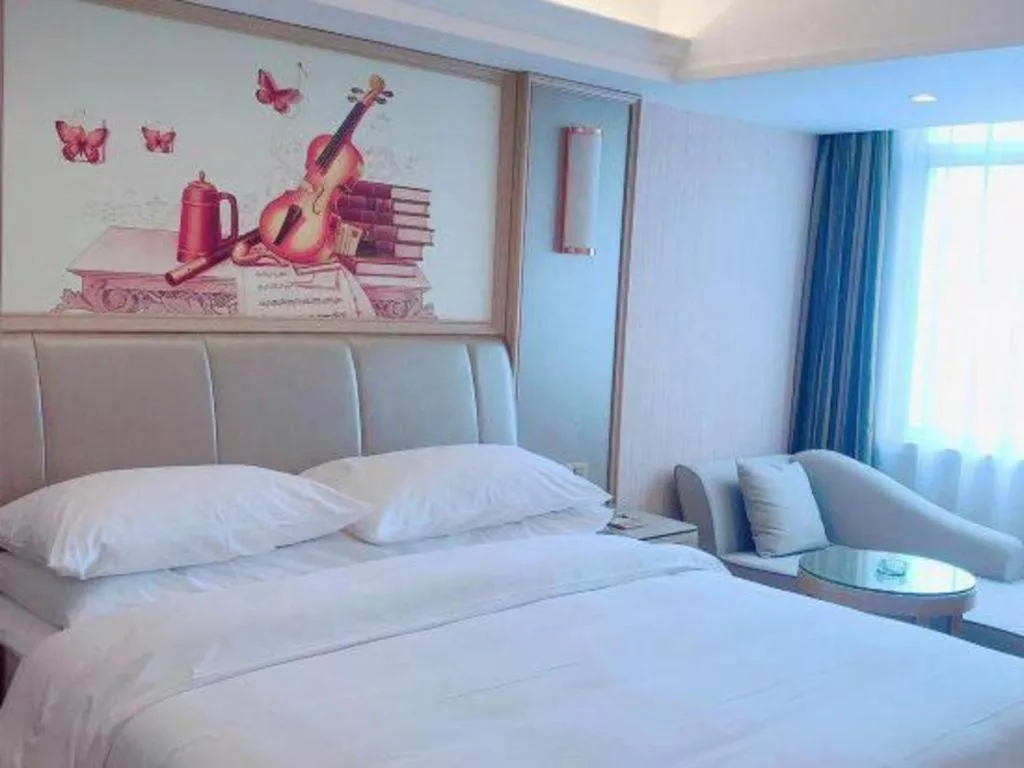 Bed in Vienna Hotel Guangxi Zhongshan Central Plaza West High-Speed Railway Station