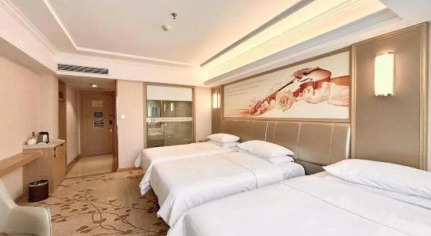 Bed in Vienna Hotel Guangxi Zhongshan Central Plaza West High-Speed Railway Station