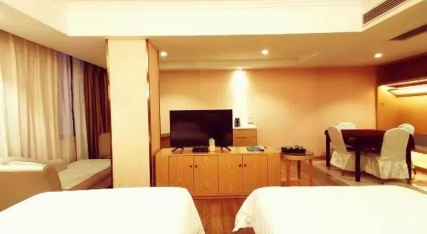 Bed in Vienna Hotel Guangxi Zhongshan Central Plaza West High-Speed Railway Station