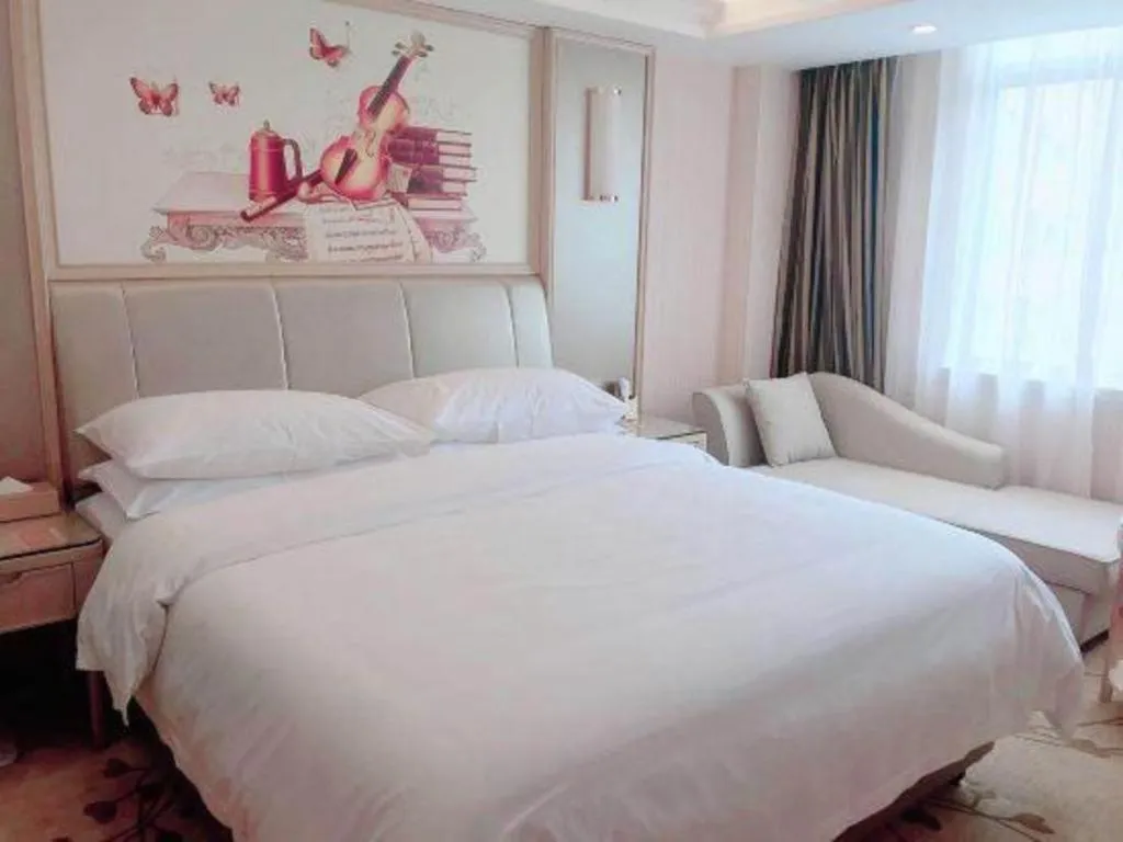 Bed in Vienna Hotel Guangxi Zhongshan Central Plaza West High-Speed Railway Station