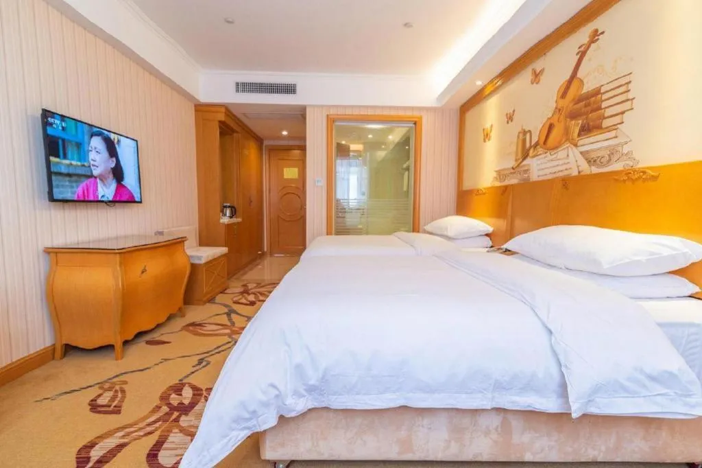 Bed in Vienna Hotel Hubei Jinzhou Jianli Jiangcheng