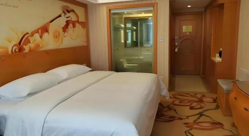 Bed in Vienna Hotel Hubei Jinzhou Jianli Jiangcheng