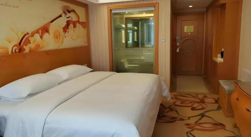 Bed in Vienna Hotel Hubei Jinzhou Jianli Jiangcheng