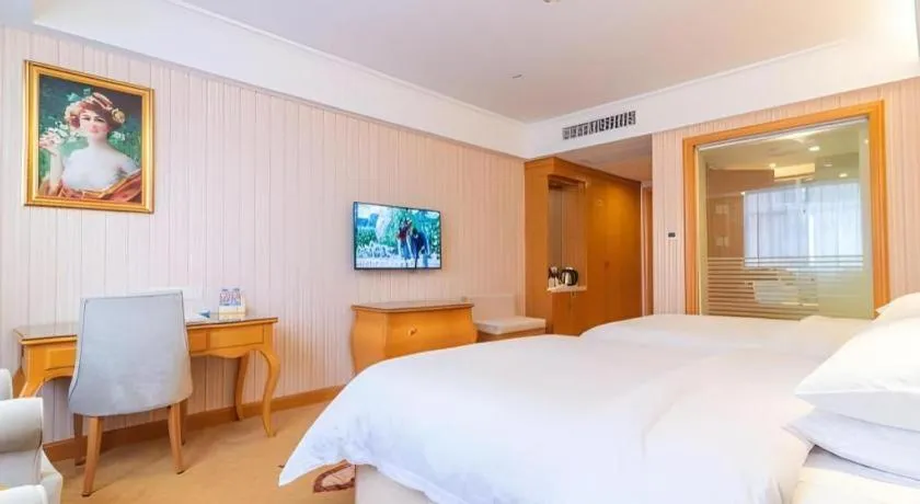 Bed in Vienna Hotel Hubei Jinzhou Jianli Jiangcheng