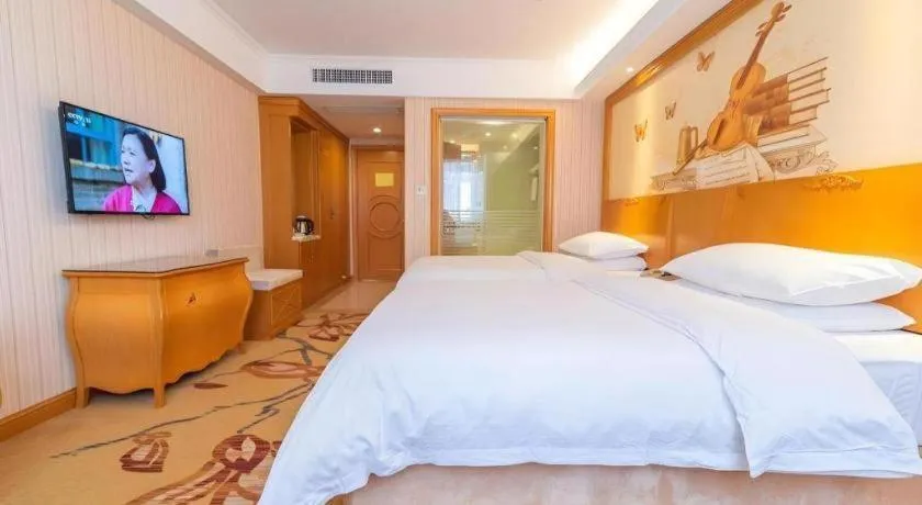 Bed in Vienna Hotel Hubei Jinzhou Jianli Jiangcheng