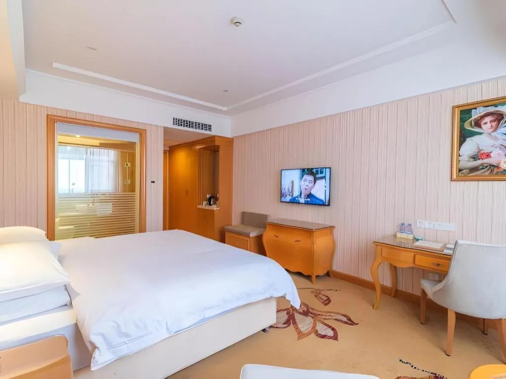 Bed in Vienna Hotel Hubei Jinzhou Jianli Jiangcheng