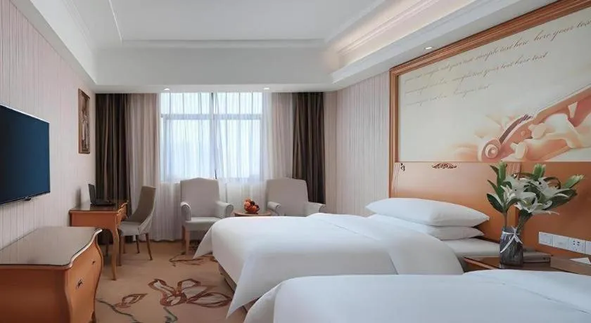 Bed in Vienna Hotel Hubei Jinzhou Jianli Jiangcheng