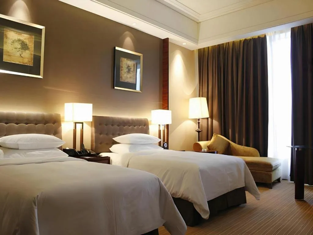 Bed in Venus Royal Hotel Shenzhen International Exhibition Center