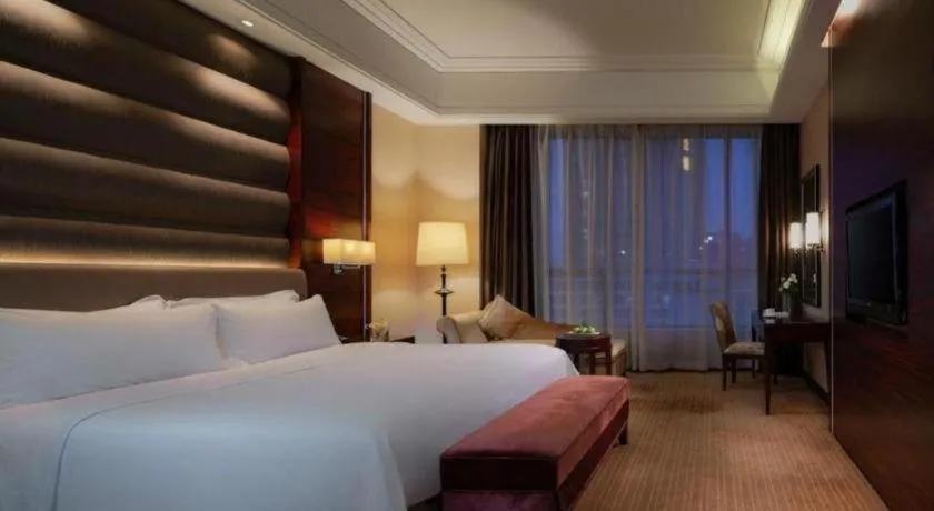 Bed in Venus Royal Hotel Shenzhen International Exhibition Center