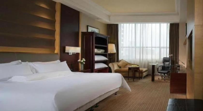 Bed in Venus Royal Hotel Shenzhen International Exhibition Center