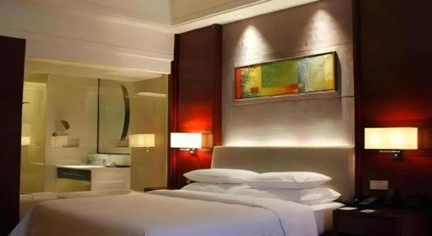 Bed in Venus Royal Hotel Shenzhen International Exhibition Center