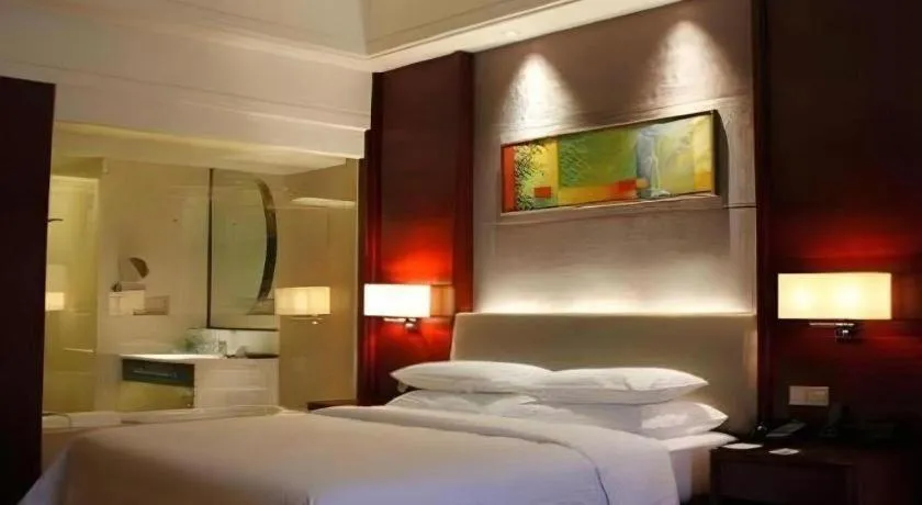 Bed in Venus Royal Hotel Shenzhen International Exhibition Center