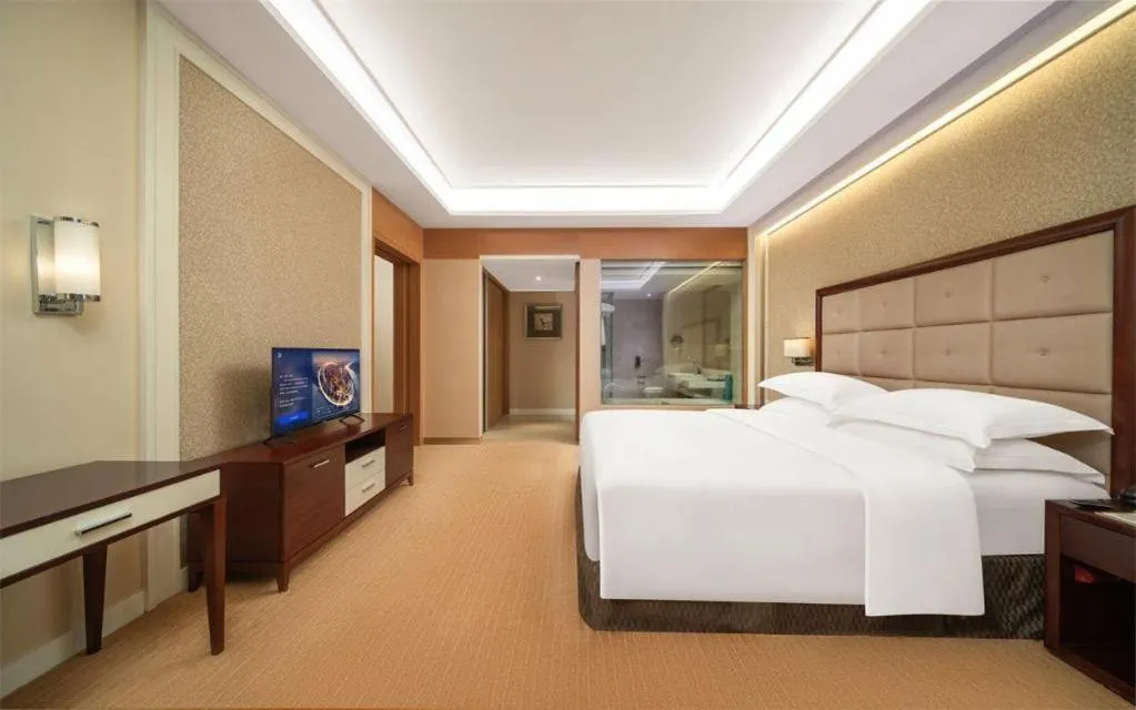 Bed in Venus Royal Hotel Shenzhen International Exhibition Center