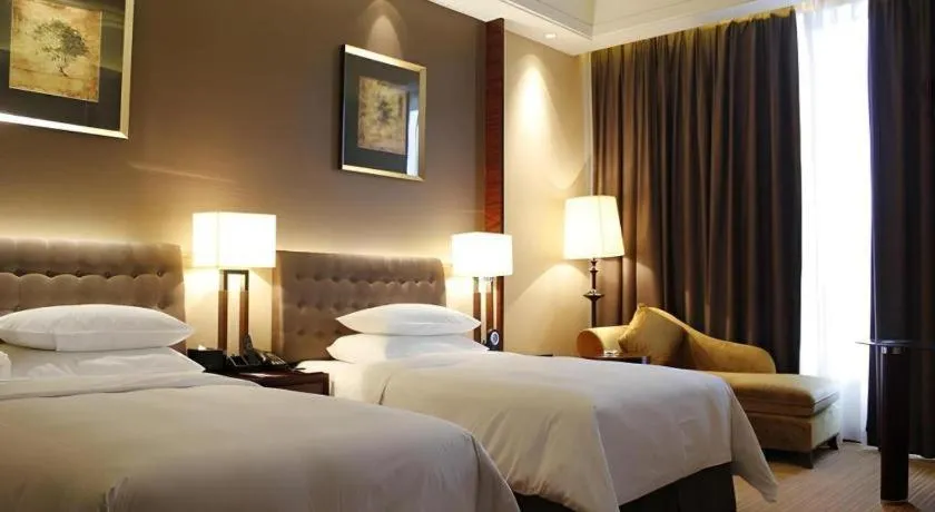 Bed in Venus Royal Hotel Shenzhen International Exhibition Center