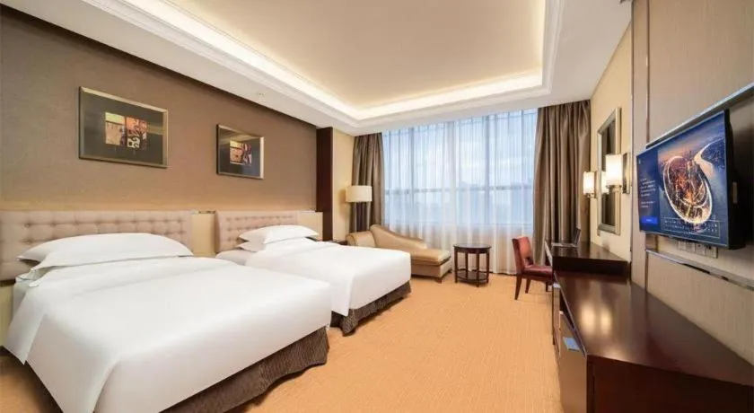 Bed in Venus Royal Hotel Shenzhen International Exhibition Center