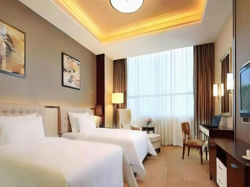 Bed in Venus Royal Hotel Shenzhen International Exhibition Center